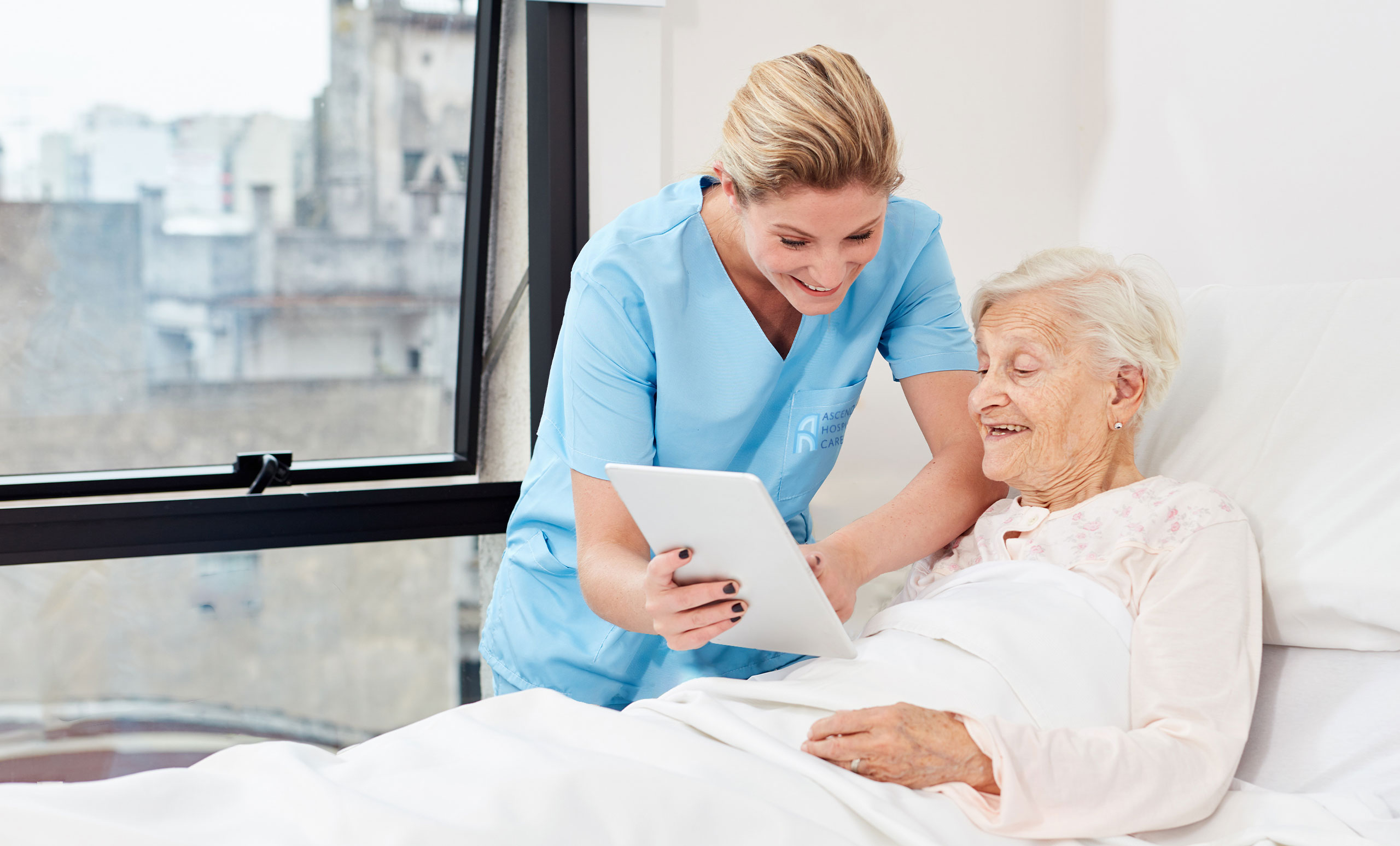 Nurse assisting patient