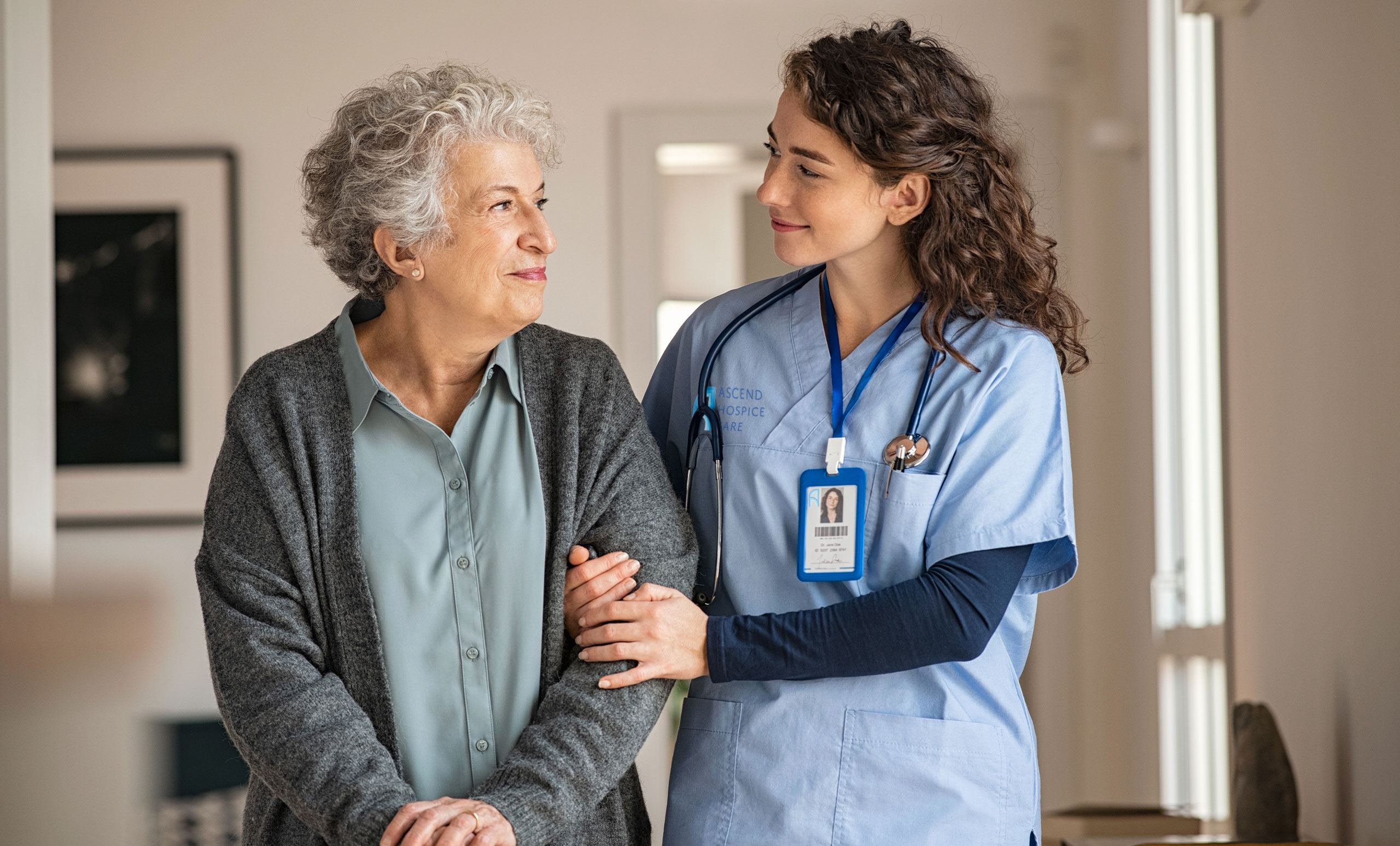 Palliative care nurse caring for patient