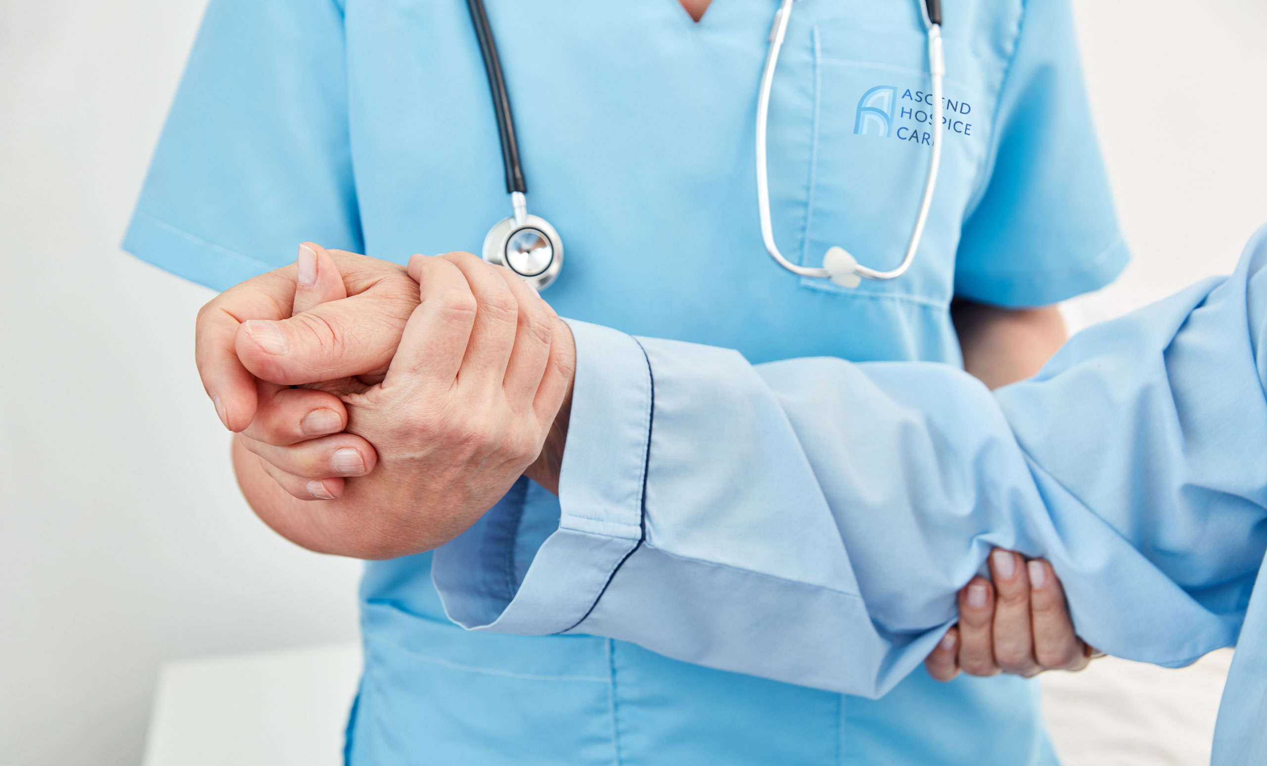 nurse providing support for hospice patient